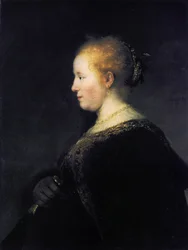 A Young Woman in Profile with a Fan